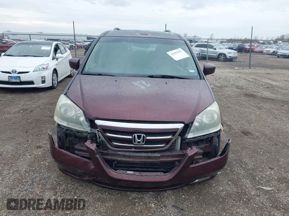 2007 Honda Odyssey Touring with VIN 5FNRL38847B048235, listed as a IAAI auction lot 41963652 with 176,412 mi miles. Bid and sale history available at carsss.com. Image 12.