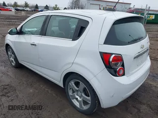 2016 Chevrolet Sonic LTZ z VIN 1G1JE6SB9G4146075, wystawiony jako IAAI lot #41750534 z przebiegiem 103 240 mil mil oraz . Historia ofert i sprzedaży dostępna na DreamBid. Obrazek 3.