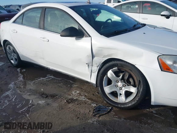 2009 Pontiac G6 1SA z VIN 1G2ZG57B394187803, wystawiony jako IAAI lot #41100404 z przebiegiem 242 388 mil mil oraz . Historia ofert i sprzedaży dostępna na DreamBid. Obrazek 6.