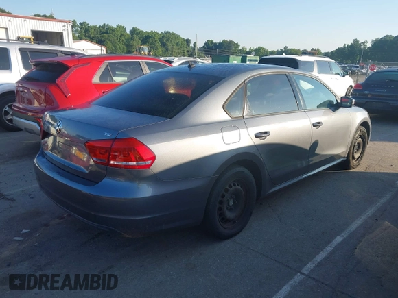 2014 Volkswagen Passat Wolfsburg Edition with VIN 1VWAT7A36EC052846, listed as a IAAI auction lot 42467068 with 186,162 mi miles and . Bid and sale history available at DreamBid. Image 4.