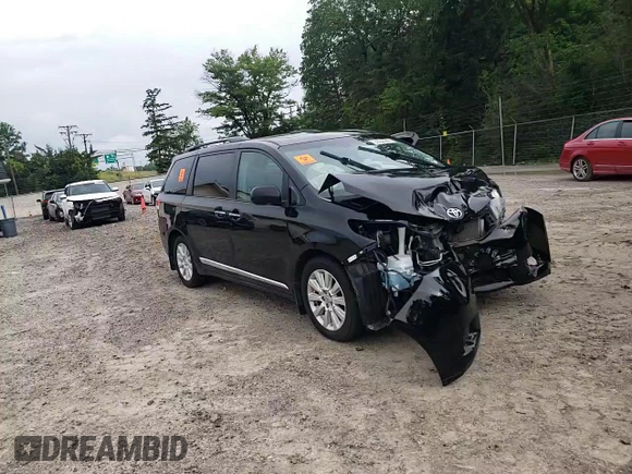 2011 Toyota Sienna XLE with VIN 5TDDK3DC8BS020059, listed as a Copart auction lot 62954985 with 219,974 mi miles and Salvage title. Bid and sale history available at DreamBid. Image 14.