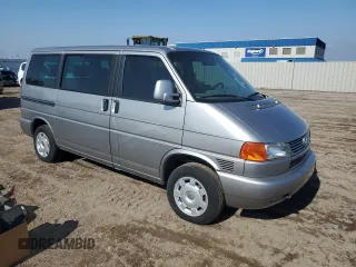 2000 Volkswagen EuroVan с VIN WV2MH4703YH013265, выставлен на аукционе Copart как лот 59003645 с пробегом Не указан миль и Списание • Salvage title. История ставок и продаж доступна на DreamBid. Изображение 4.