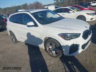 2021 BMW X1 xDrive28i with VIN WBXJG9C04M5S84454, listed as a IAAI auction lot 41373515 with 45,030 mi miles. Bid and sale history available at carsss.com. Image 1.