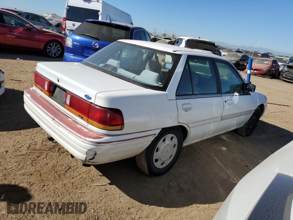 1994 Ford Escort z VIN 3FARP13J4RR122084, wystawiony jako Copart lot #73184804 z przebiegiem 238 604 mil mil oraz Nie do naprawy. Historia ofert i sprzedaży dostępna na DreamBid. Obrazek 3.