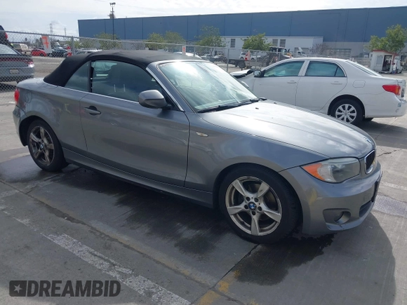 2012 BMW 1 Series 128i with VIN WBAUN1C52CVR00421, listed as a IAAI auction lot 41594256 with 107,957 mi miles and . Bid and sale history available at DreamBid. Image 1.