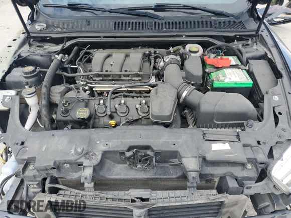 2018 Ford Taurus SEL with VIN 1FAHP2E8XJG137325, listed as a Copart auction lot 58850415 with 84,540 mi miles and Salvage title. Bid and sale history available at DreamBid. Image 11.