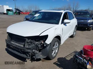 2019 Audi Q3 Premium with VIN WA1AECF37K1077089, listed as a IAAI auction lot 41742732 with 61,038 mi miles and . Bid and sale history available at DreamBid. Image 2.
