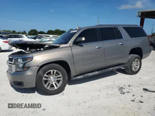 2018 Chevrolet Suburban LS z VIN 1GNSCGKC6JR249746, wystawiony jako Copart lot #55622105 z przebiegiem 126 378 mil mil oraz Szkoda całkowita • Salvage title. Historia ofert i sprzedaży dostępna na DreamBid. Obrazek 1.