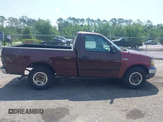 2000 Ford F-150 XL with VIN 1FTZF1721YNB05244, listed as a IAAI auction lot 42298391 with Not provided miles and . Bid and sale history available at DreamBid. Image 13.