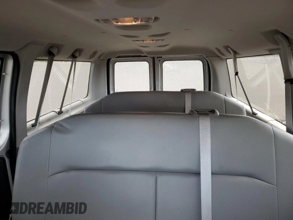 2013 Ford Econoline Passenger XL with VIN 1FMNE1BWXDDB17125, listed as a Copart auction lot 77066034 with 30,726 mi miles and Salvage title. Bid and sale history available at DreamBid. Image 10.