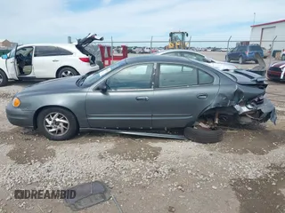 2004 Pontiac Grand Am SE1 with VIN 1G2NF52E64C257019, listed as a IAAI auction lot 42248217 with 164,581 mi miles and . Bid and sale history available at DreamBid. Image 14.