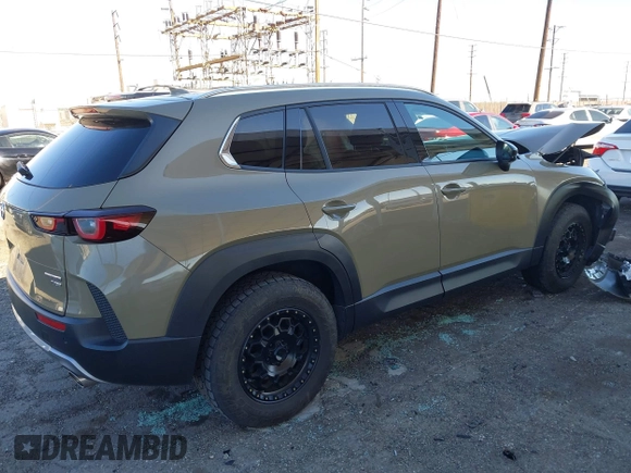 2023 Mazda CX-50 2.5 Turbo Premium Plus Package with VIN 7MMVABEY1PN100568, listed as a IAAI auction lot 41313754 with 31,325 mi miles. Bid and sale history available at carsss.com. Image 4.