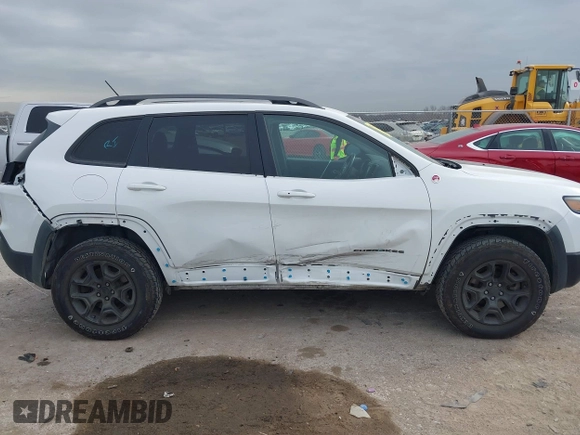 2019 Jeep Cherokee Trailhawk with VIN 1C4PJMBN6KD124023, listed as a IAAI auction lot 41432217 with 76,934 mi miles and . Bid and sale history available at DreamBid. Image 6.