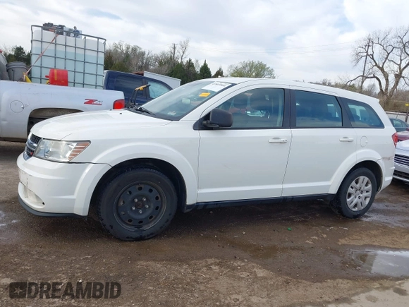 2014 Dodge Journey American Value with VIN 3C4PDCAB1ET209973, listed as a IAAI auction lot 41803864 with 168,774 mi miles and . Bid and sale history available at DreamBid. Image 14.