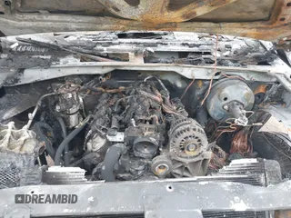 2002 Chevrolet Tahoe LT z VIN 1GNEC13Z82R238343, wystawiony jako IAAI lot #41796657 z przebiegiem Nie podano mil oraz . Historia ofert i sprzedaży dostępna na DreamBid. Obrazek 10.