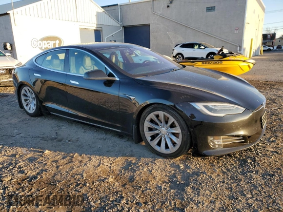 2019 Tesla Model S 75D with VIN 5YJSA1E23KF330239, listed as a Copart auction lot 86737544 with Not provided miles and Salvage title. Bid and sale history available at DreamBid. Image 4.