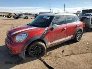 2014 MINI Countryman S with VIN WMWZC5C50EWP40992, listed as a Copart auction lot 85191624 with 114,727 mi miles and Salvage title. Bid and sale history available at DreamBid. Image 1.