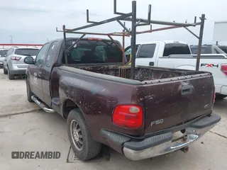 2001 Ford F-150 XL with VIN 2FTRX07W31CA59129, listed as a IAAI auction lot 41349352 with 272,026 mi miles. Bid and sale history available at carsss.com. Image 3.