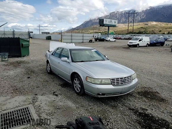 2003 Cadillac Seville Luxury SLS z VIN 1G6KS54Y53U262581, wystawiony jako Copart lot #55597595 z przebiegiem 80 832 mil mil oraz Szkoda całkowita • Salvage title. Historia ofert i sprzedaży dostępna na DreamBid. Obrazek 14.