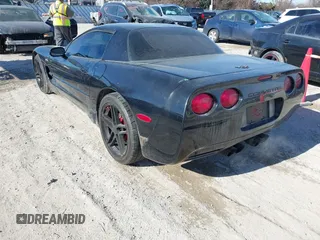 2002 Chevrolet Corvette Z06 with VIN 1G1YY12S225131395, listed as a IAAI auction lot 41440192 with 100,557 mi miles. Bid and sale history available at carsss.com. Image 3.