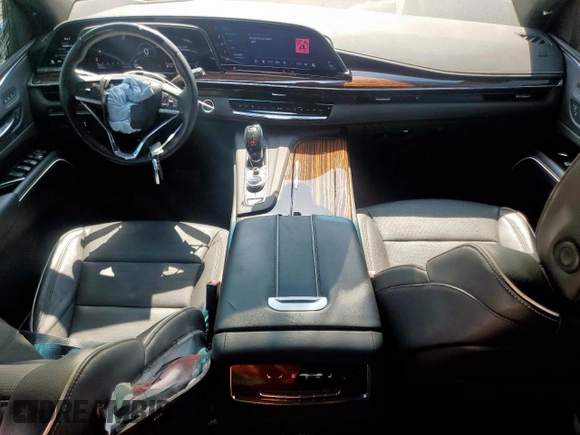2023 Cadillac Escalade z VIN 1GYS3KKL9PR262067, wystawiony jako Copart lot #59101095 z przebiegiem 43 884 mil mil oraz Szkody całkowita. Historia ofert i sprzedaży dostępna na DreamBid. Obrazek 8.