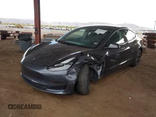 2023 Tesla Model 3 with VIN 5YJ3E1EA6PF655510, listed as a IAAI auction lot 41948480 with 27,179 mi miles and . Bid and sale history available at carsss.com. Image 2.