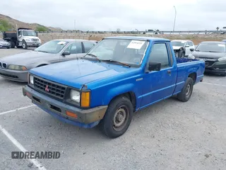 1990 Mitsubishi Mighty Max with VIN JA7FL24W8LP030657, listed as a IAAI auction lot 42014231 with 376,787 mi miles and . Bid and sale history available at DreamBid. Image 2.