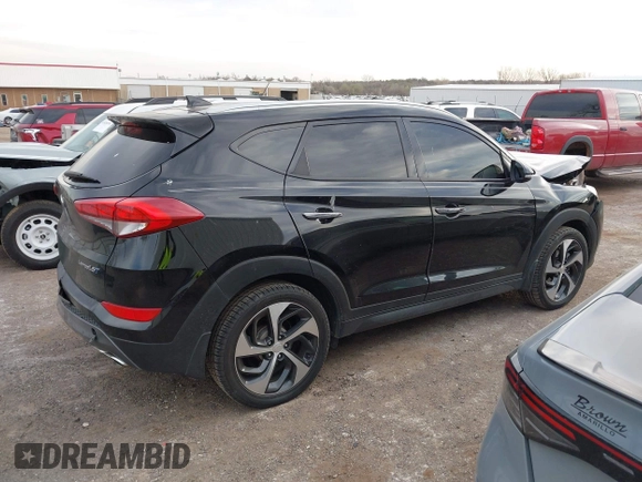 2016 Hyundai Tucson Limited with VIN KM8J33A28GU157187, listed as a IAAI auction lot 41825266 with 137,649 mi miles. Bid and sale history available at carsss.com. Image 13.
