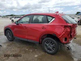 2019 Mazda CX-5 Sport with VIN JM3KFABM5K1597891, listed as a Copart auction lot 55020815 with 100,454 mi miles and Non Repairable. Bid and sale history available at DreamBid. Image 2.