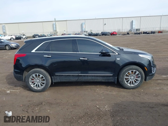 2019 Cadillac XT5 Luxury AWD with VIN 1GYKNDRS5KZ172975, listed as a IAAI auction lot 41814397 with 63,563 mi miles and . Bid and sale history available at carsss.com. Image 13.