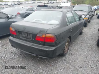 2000 Honda Civic LX with VIN 1HGEJ6674YL005143, listed as a IAAI auction lot 41961215 with 252,818 mi miles. Bid and sale history available at carsss.com. Image 4.