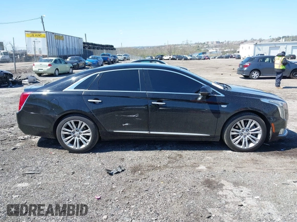 2018 Cadillac XTS Luxury with VIN 2G61M5S39J9161938, listed as a IAAI auction lot 42005882 with 102,335 mi miles. Bid and sale history available at carsss.com. Image 13.