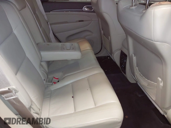 2018 Jeep Grand Cherokee Limited with VIN 1C4RJFBG2JC139502, listed as a IAAI auction lot 41372877 with 145,877 mi miles and . Bid and sale history available at DreamBid. Image 8.