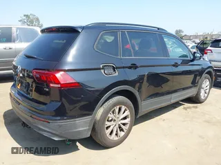 2018 Volkswagen Tiguan S with VIN 3VV1B7AX7JM092033, listed as a IAAI auction lot 42373619 with 124,775 mi miles and . Bid and sale history available at DreamBid. Image 4.