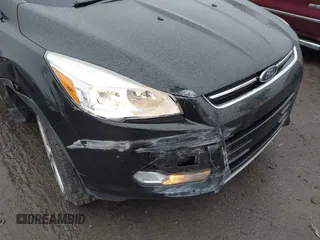 2015 Ford Escape Titanium with VIN 1FMCU0J97FUB45709, listed as a IAAI auction lot 41561636 with 88,296 mi miles. Bid and sale history available at carsss.com. Image 6.