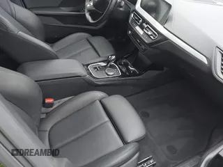 2021 BMW 2 Series 228i with VIN WBA53AK01M7J12347, listed as a IAAI auction lot 42432565 with 52,559 mi miles and . Bid and sale history available at DreamBid. Image 5.