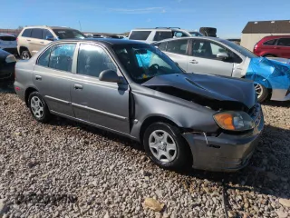 2004 Hyundai Accent GL with VIN KMHCG45C94U523529, listed as a Copart auction lot 50016085 with 188,120 mi miles and Salvage Title. Bid and sale history available at carsss.com. Image 4.