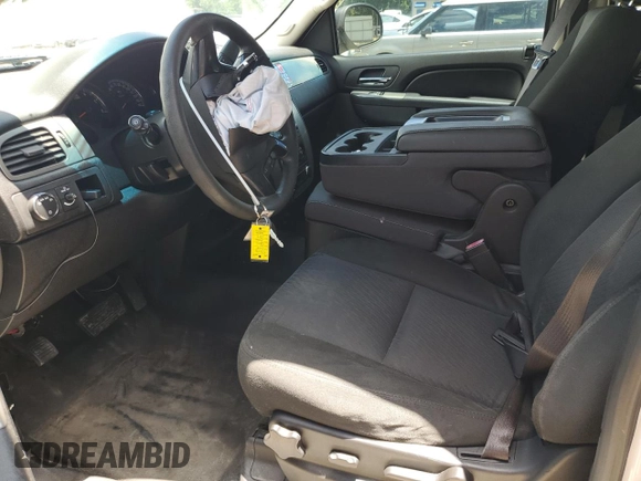 2014 Chevrolet Tahoe Commercial with VIN 1GNLC2E04ER202441, listed as a Copart auction lot 61310725 with 117,443 mi miles and Salvage title. Bid and sale history available at DreamBid. Image 7.