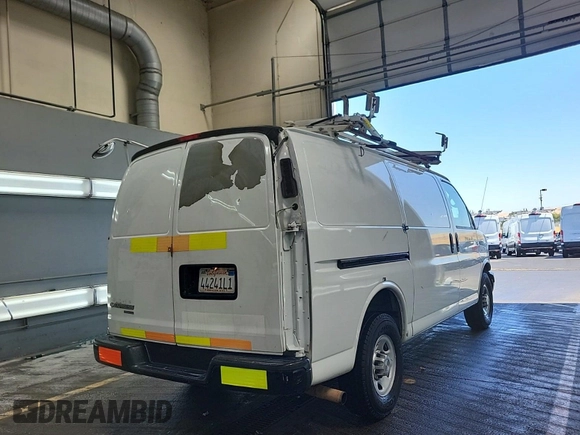 2012 Chevrolet Express Cargo with VIN 1GCWGFCA8C1179156, listed as a IAAI auction lot 42667299 with 168,910 mi miles and . Bid and sale history available at DreamBid. Image 13.