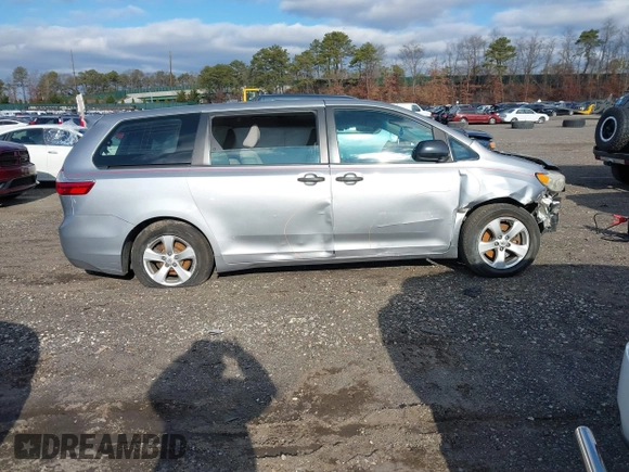 2015 Toyota Sienna L with VIN 5TDZK3DCXFS596277, listed as a IAAI auction lot 41229427 with 108,900 mi miles and . Bid and sale history available at DreamBid. Image 13.
