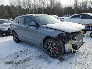 2022 BMW X2 xDrive28i with VIN WBXYJ1C03N5U59814, listed as a Copart auction lot 86088784 with 60,787 mi miles and Salvage Title. Bid and sale history available at carsss.com. Image 4.