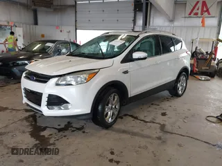 2016 Ford Escape Titanium with VIN 1FMCU9J90GUA18743, listed as a IAAI auction lot 42419730 with 102,666 mi miles and . Bid and sale history available at DreamBid. Image 18.