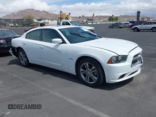 2014 Dodge Charger RT Plus with VIN 2C3CDXDT1EH320384, listed as a IAAI auction lot 41953887 with 79,126 mi miles. Bid and sale history available at carsss.com. Image 1.