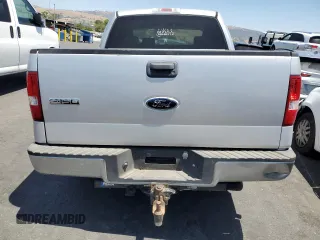2006 Ford F-150 XLT with VIN 1FTRW12W16FA69394, listed as a Copart auction lot 59259015 with 96,303 mi miles and Salvage title. Bid and sale history available at DreamBid. Image 6.