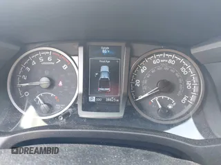 2021 Toyota Tacoma SR with VIN 3TMCZ5AN0MM417261, listed as a IAAI auction lot 42240693 with 38,625 mi miles and . Bid and sale history available at DreamBid. Image 7.