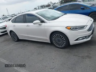 2017 Ford Fusion SE with VIN 3FA6P0HD0HR180188, listed as a IAAI auction lot 42146020 with 100,901 mi miles and . Bid and sale history available at DreamBid. Image 13.