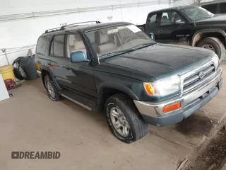 1998 Toyota 4Runner SR5 z VIN JT3HN86R1W0193054, wystawiony jako IAAI lot #42347361 z przebiegiem 235 533 mil mil oraz . Historia ofert i sprzedaży dostępna na DreamBid. Obrazek 1.