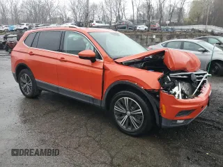 2019 Volkswagen Tiguan SE with VIN 3VV2B7AX7KM013949, listed as a Copart auction lot 51662645 with 74,039 mi miles and Salvage Title. Bid and sale history available at DreamBid. Image 4.