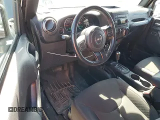 2016 Jeep Wrangler Sport with VIN 1C4AJWAG1GL288068, listed as a Copart auction lot 54255485 with 56,385 mi miles and Non Repairable. Bid and sale history available at carsss.com. Image 8.