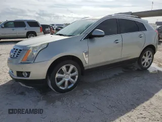 2014 Cadillac SRX Performance Collection with VIN 3GYFNCE3XES655115, listed as a Copart auction lot 89176625 with 144,639 mi miles and Salvage Title. Bid and sale history available at carsss.com. Image 1.